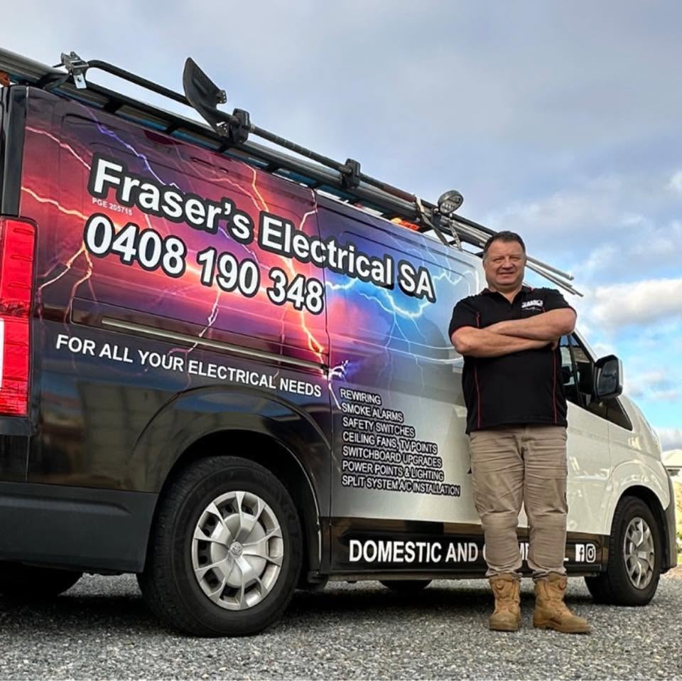 Fraser, your local licensed electrician, in front of the Fraser's Electrical SA ute