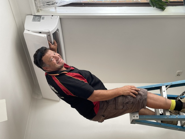 Fraser installing a split system air conditioner
